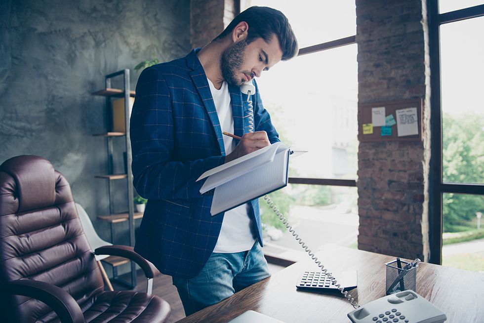 Businessman plans his schedule for Monday