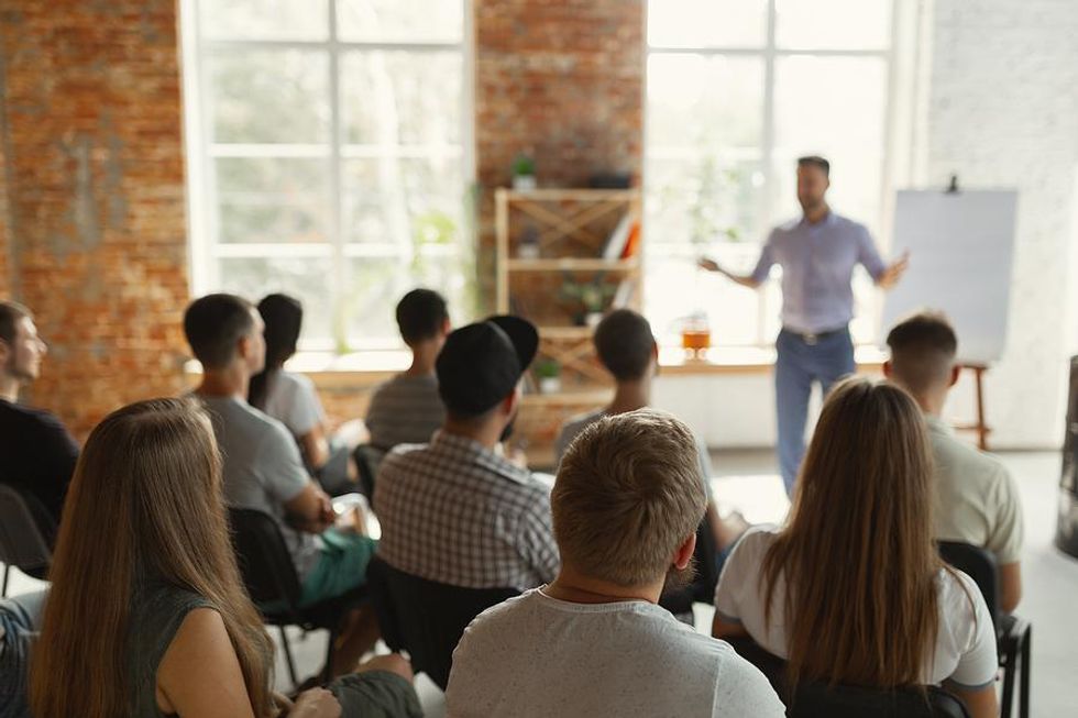 College students listen to a presentation about professional development