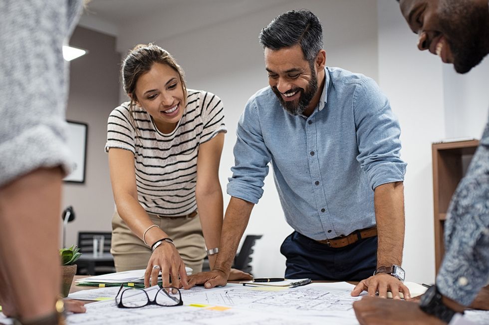 Coworkers work on a team project