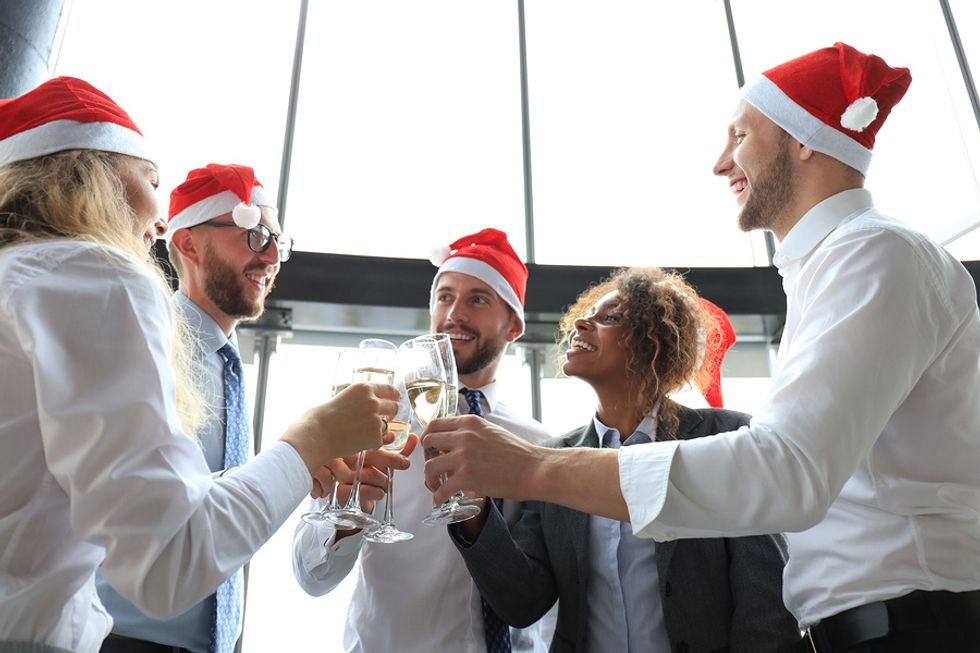 Employees networking at the office holiday party