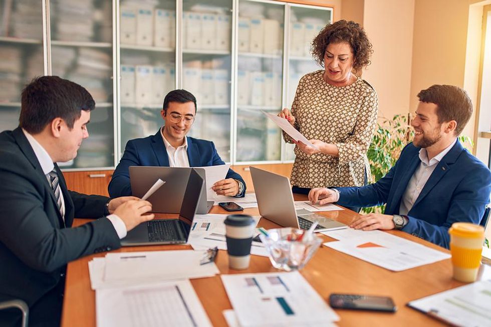 Group of happy professionals at work