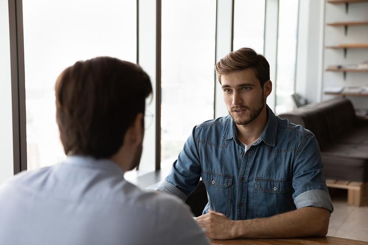 Man accepts a job offer during an interview
