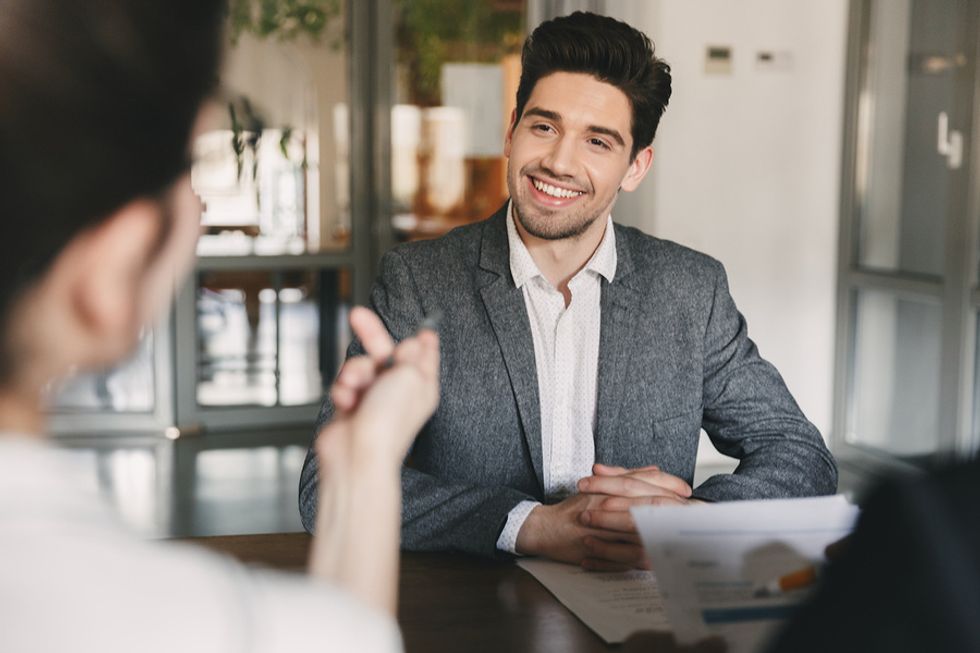 Man is confident during an interview after visualizing his success
