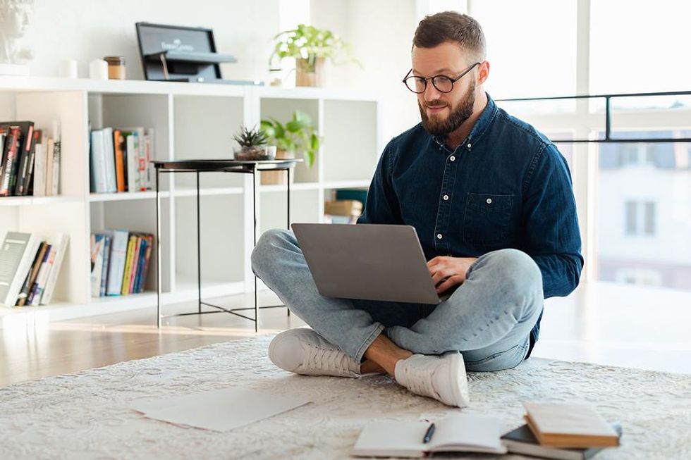 Man on laptop writes a disruptive cover letter