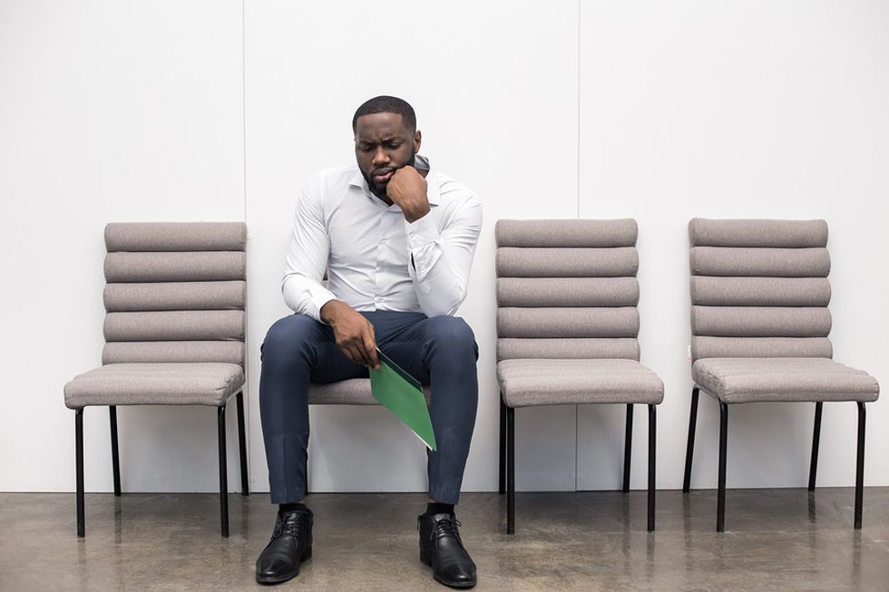 Man waiting for an interview for a job with less competition during the holiday season