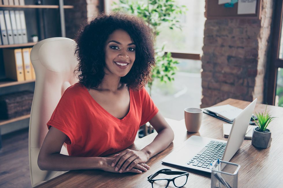 Successful woman is happy working her dream job every day