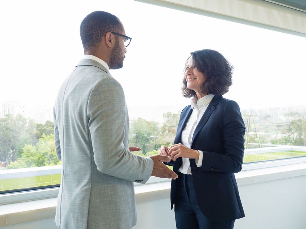 Two coworkers talk about a condescending coworker