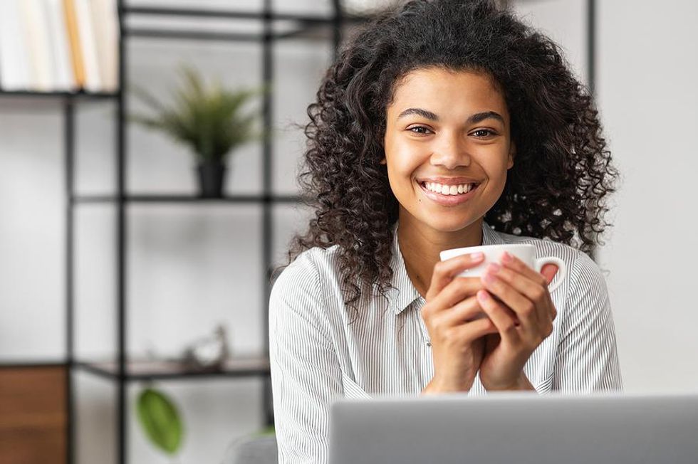 Well-rested woman at work on a Monday morning