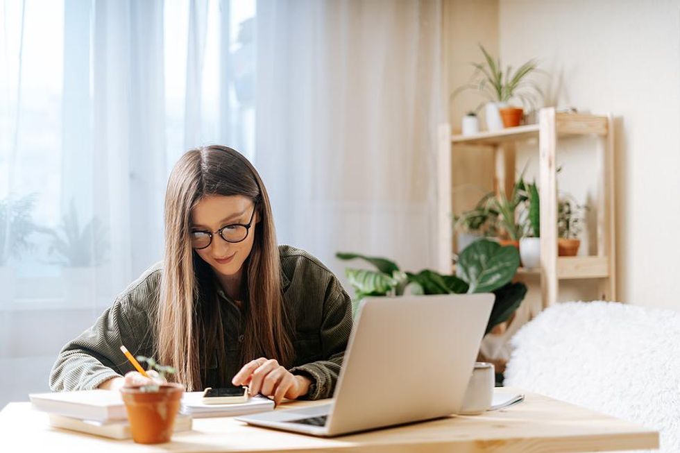 Woman looking at phone tries to find the hidden job market