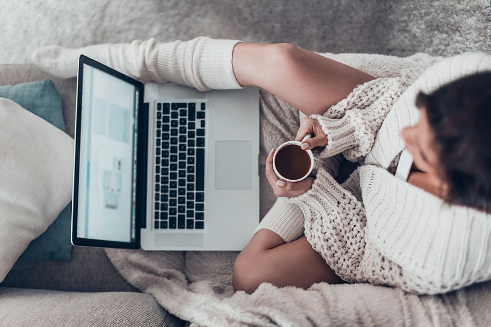 Woman on laptop works on her personal brand over the holiday break