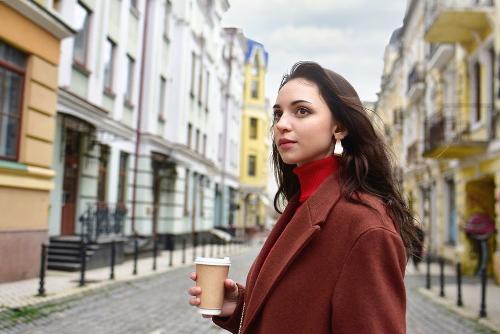 Young woman walking to work/internship